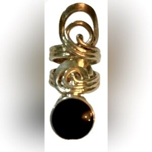 Stainless Steel ring, made w/ Oneida Fork. Crafted into a ring with black onyx. 